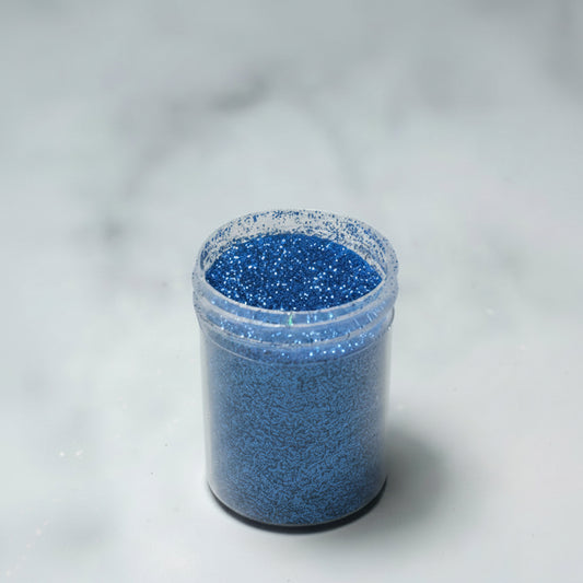 Escarcha comestible brillante color azul para decoración de repostería en Vallia Repostería