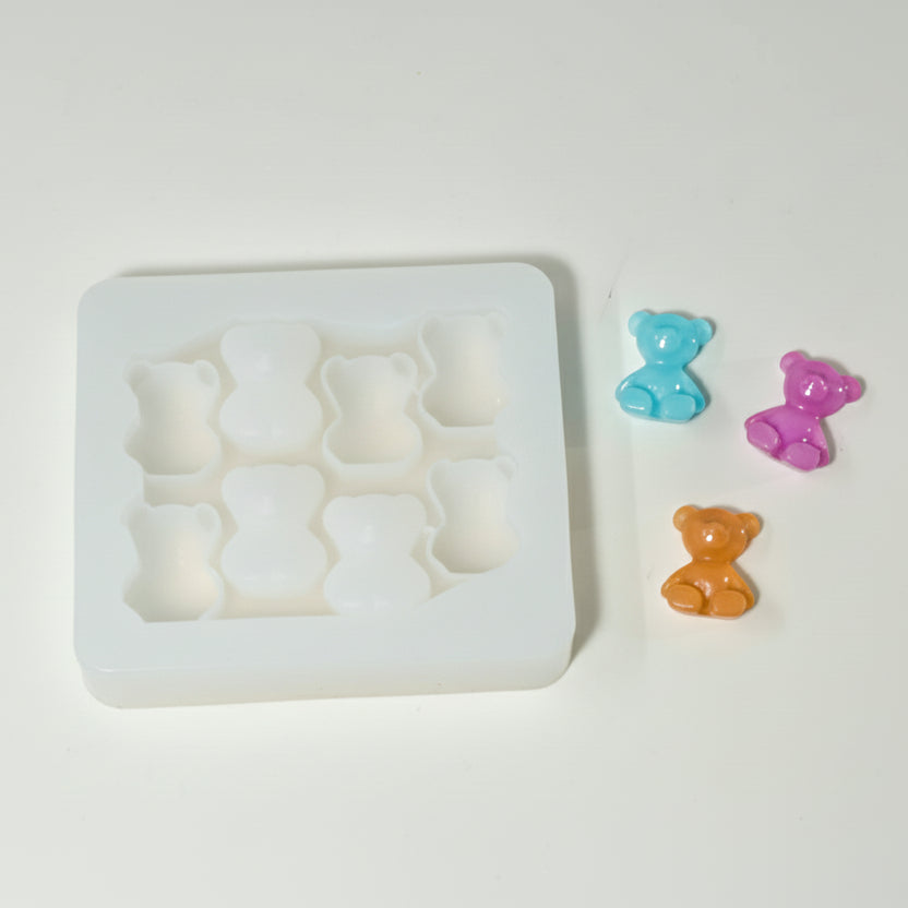Molde de silicona blanco de 8 cavidades en forma de ositos para resina, gomitas, chocolates o jabones artesanales.