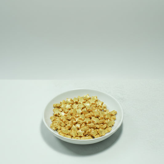 Grageas comestibles coloridas en paquete de 50g para decoración de tortas, cupcakes y galletas. Variedad de colores y tamaños para repostería profesional.