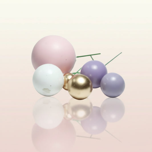 Globos de espuma de diferentes medidas y tonos lila para decoración de tortas y postres - Vallia Reposteria