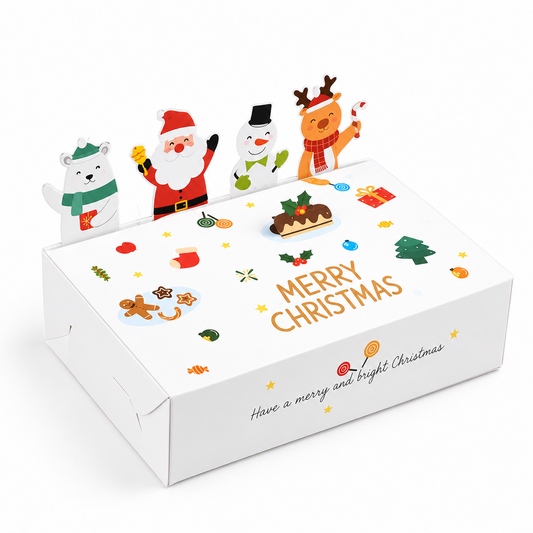 Caja decorativa Vallia Repostería blanca con ilustraciones navideñas de Santa, renos y dulces para regalos festivos.