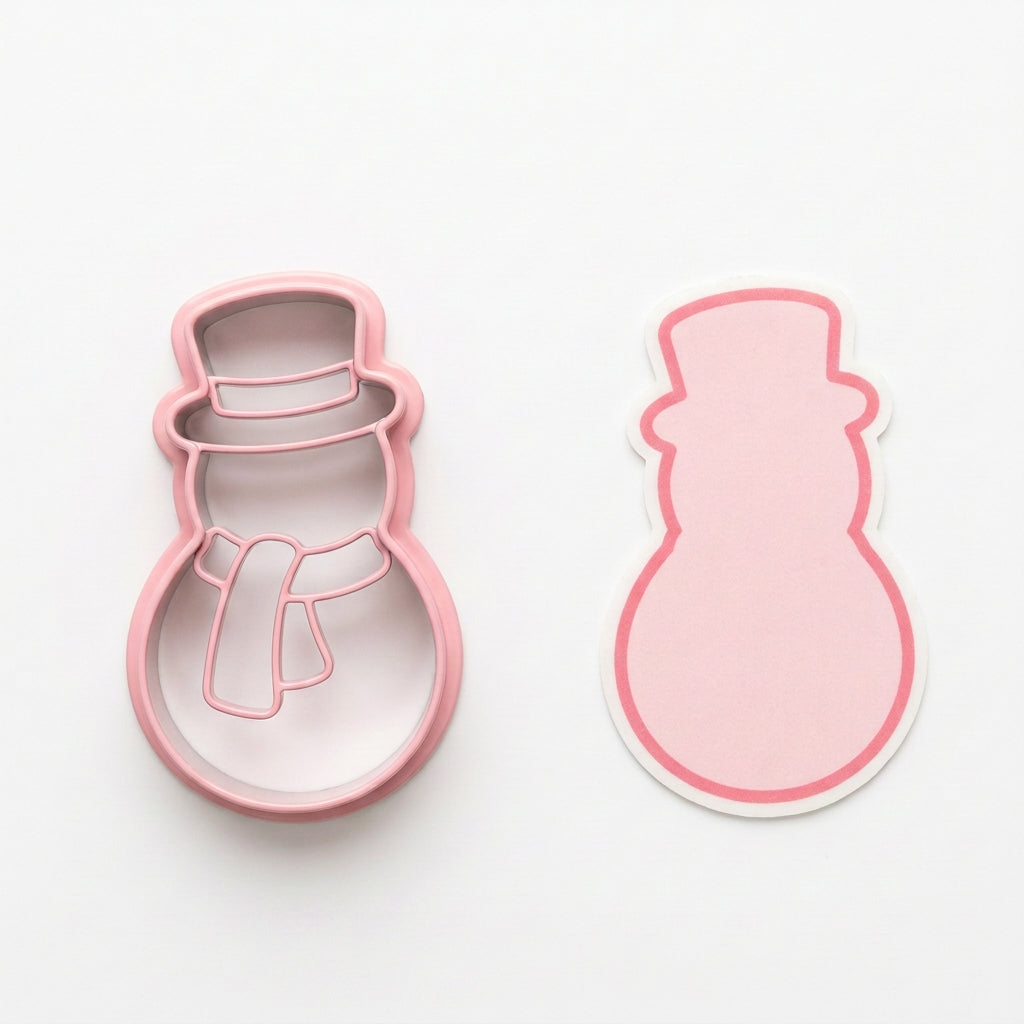 cortador y sello muñeco de nieve Vallia Repostería con diseño de muñeco de nieve en tonos rosados, ideal para decorar galletas y postres