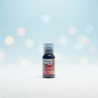 Colorante en gel Colorisa color azul en frasco dosificador 13 gr con fondo bokeh celeste – colorante para fondant y merengues - Vallia Reposteria