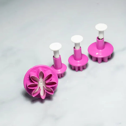 Set de 4 Cortadores con Expulsor en Forma de Flor Margarita