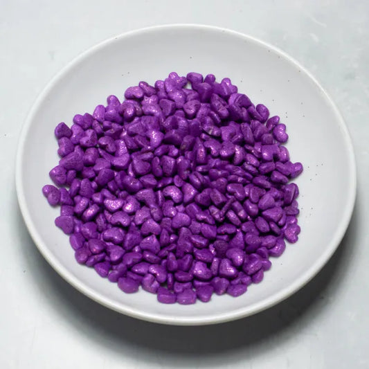 Grageas comestibles coloridas en paquete de 50g para decoración de tortas, cupcakes y galletas. Variedad de colores y tamaños para repostería profesional.