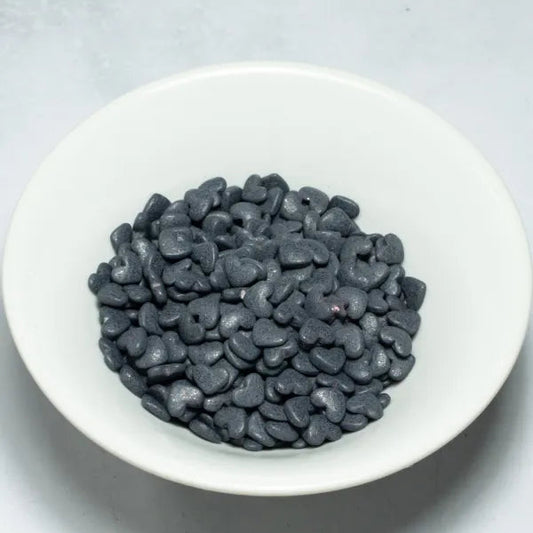 Grageas comestibles coloridas en paquete de 50g para decoración de tortas, cupcakes y galletas. Variedad de colores y tamaños para repostería profesional.