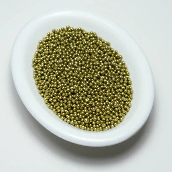 Grageas comestibles coloridas en paquete de 50g para decoración de tortas, cupcakes y galletas. Variedad de colores y tamaños para repostería profesional.