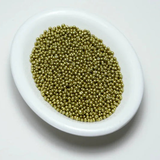 Grageas comestibles coloridas en paquete de 50g para decoración de tortas, cupcakes y galletas. Variedad de colores y tamaños para repostería profesional.