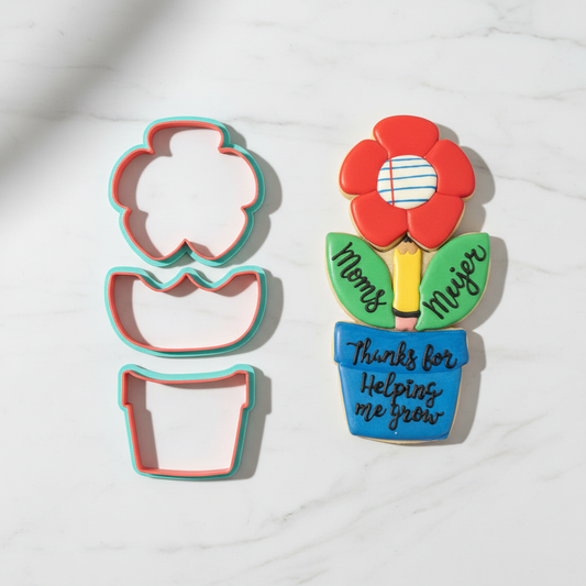 Cortador de maceta con flor - fotografía profesional