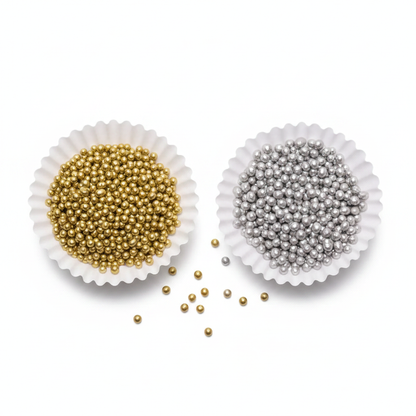 Capacillos con grageas perladas comestibles doradas y plateadas de Vallia Repostería para decorar tortas y postres