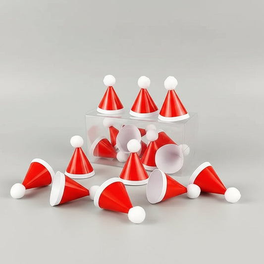 Mini gorros de Papá Noel rojos decorando cupcakes navideños de Vallia Repostería