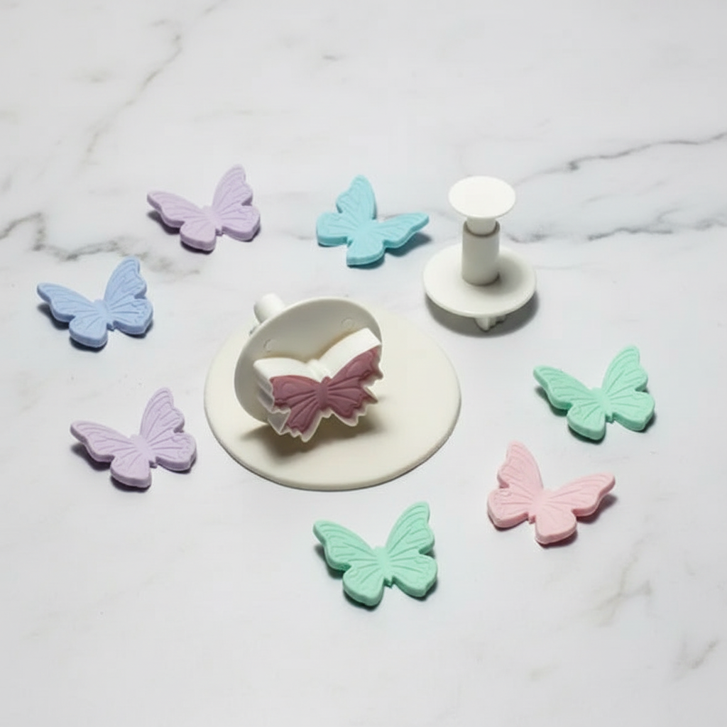 Set de cortadores de mariposas con émbolo - fotografía profesional