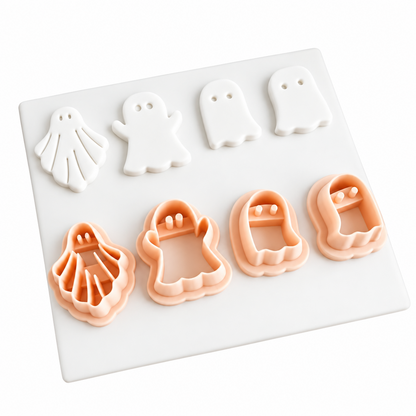 Set de 4 cortadores de galletas Vallia Repostería con formas de fantasmas en color blanco y durazno sobre base blanca