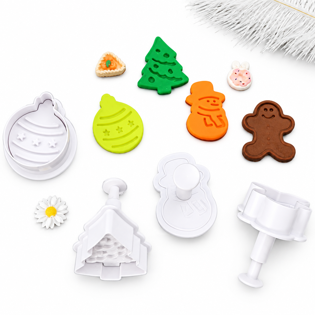 Set de 4 cortadores de galletas Vallia Repostería con diseños navideños y sistema de sello para relieves en masa