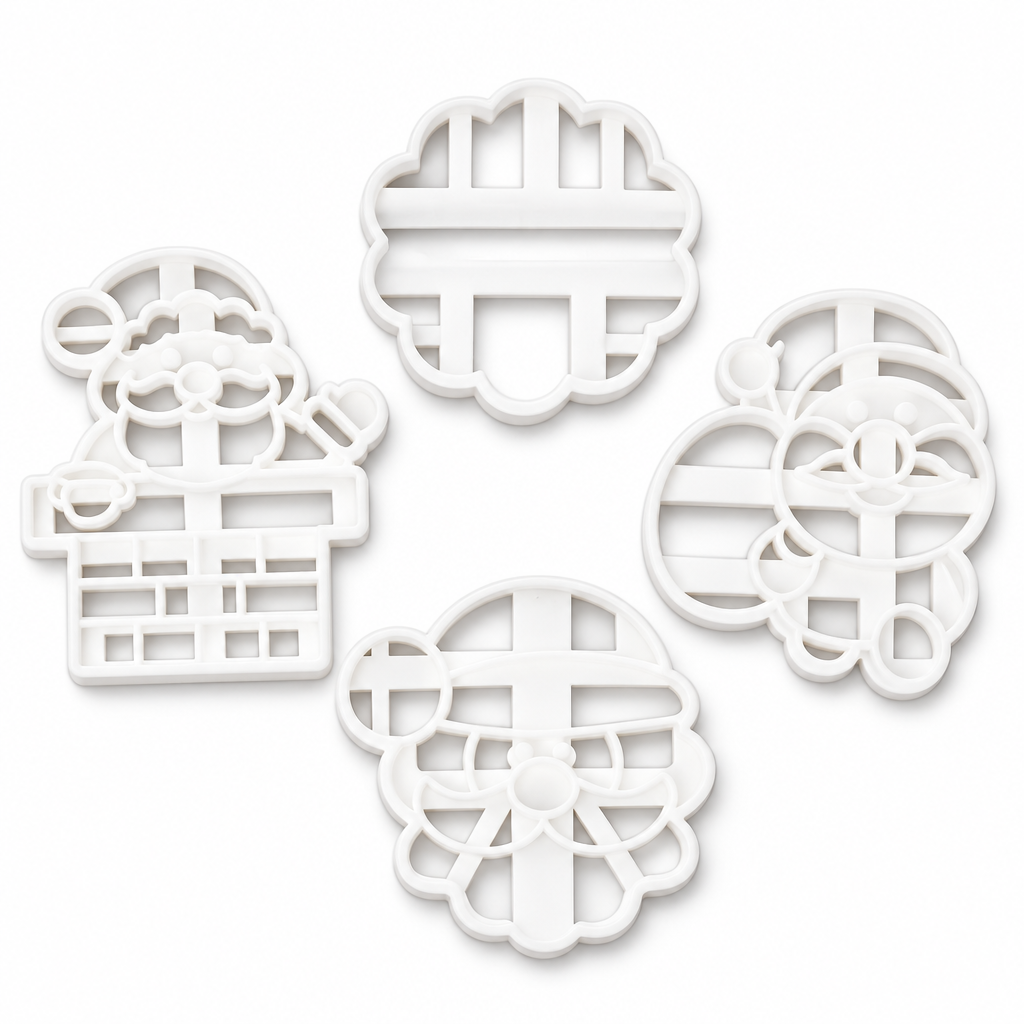 Set de 4 cortadores de galletas navideños de Vallia Repostería con formas de Santa Claus en plástico blanco