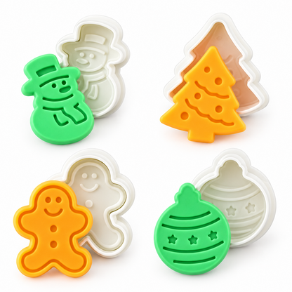 Set de 4 cortadores de galletas navideños Vallia Repostería con diseños de muñeco de nieve, árbol, jengibre y esfera.