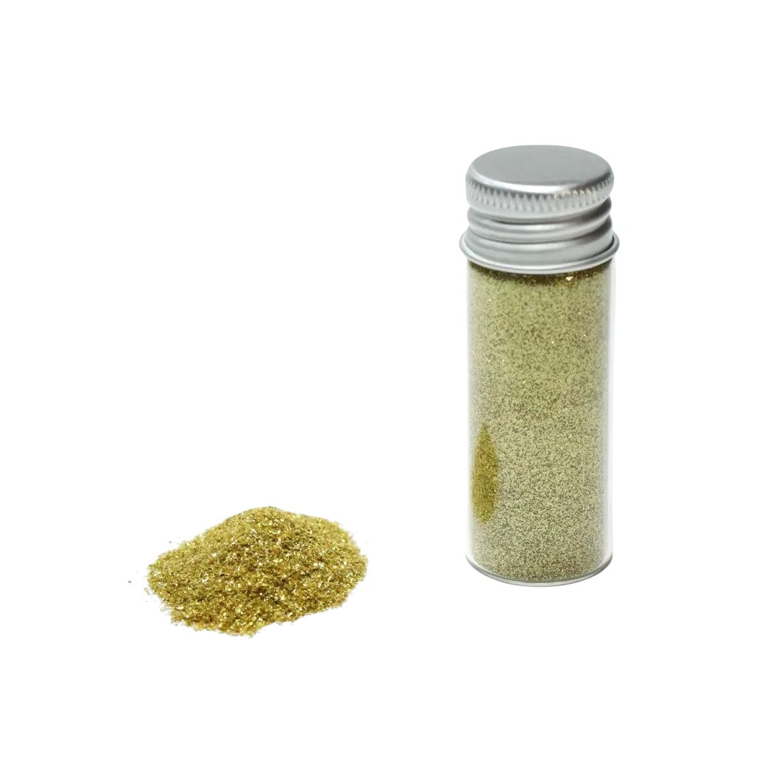 Escarcha comestible dorada de Vallia Repostería en frasco de 10 g con una pequeña muestra de polvo brillante al lado