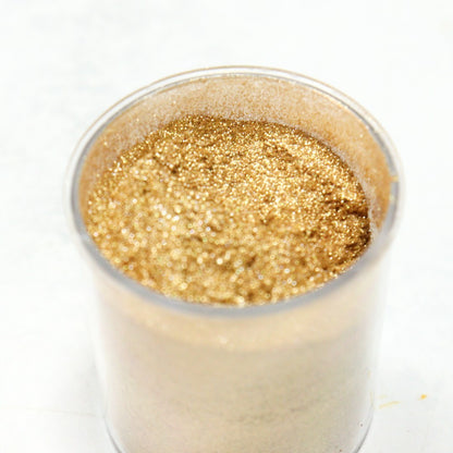 Vallia Repostería edible gold shimmer dust in a 10g jar for high-definition metallic cake and dessert decoration.