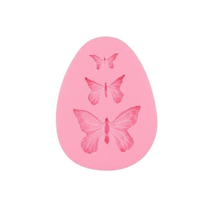 Molde de silicona rosa Vallia Repostería con tres cavidades de mariposas de distintos tamaños para fondant y manualidades