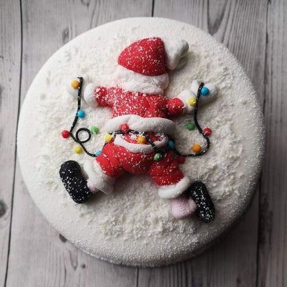 Molde de silicona Vallia Repostería para figura de Papá Noel caído en la nieve, ideal para decorar tortas navideñas.