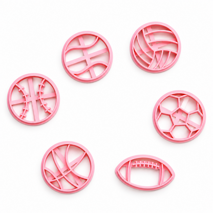 Set de seis moldes de plástico rosa Vallia Repostería con formas de balones deportivos para galletas y fondant