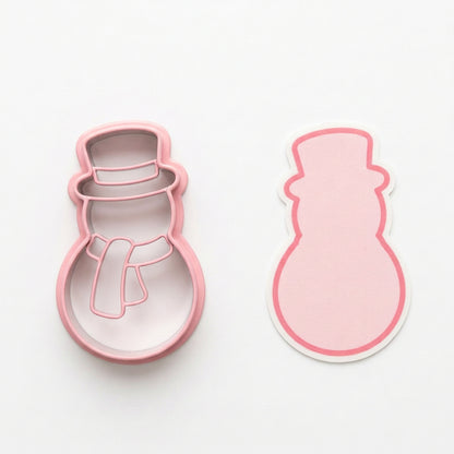 cortador y sello muñeco de nieve Vallia Repostería con diseño de muñeco de nieve en tonos rosados, ideal para decorar galletas y postres
