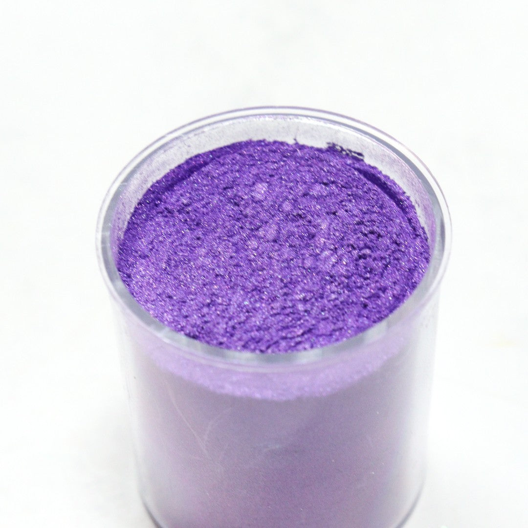 Vallia Repostería edible purple shimmer dust in a 10g jar with a fine metallic finish for cake decorating.
