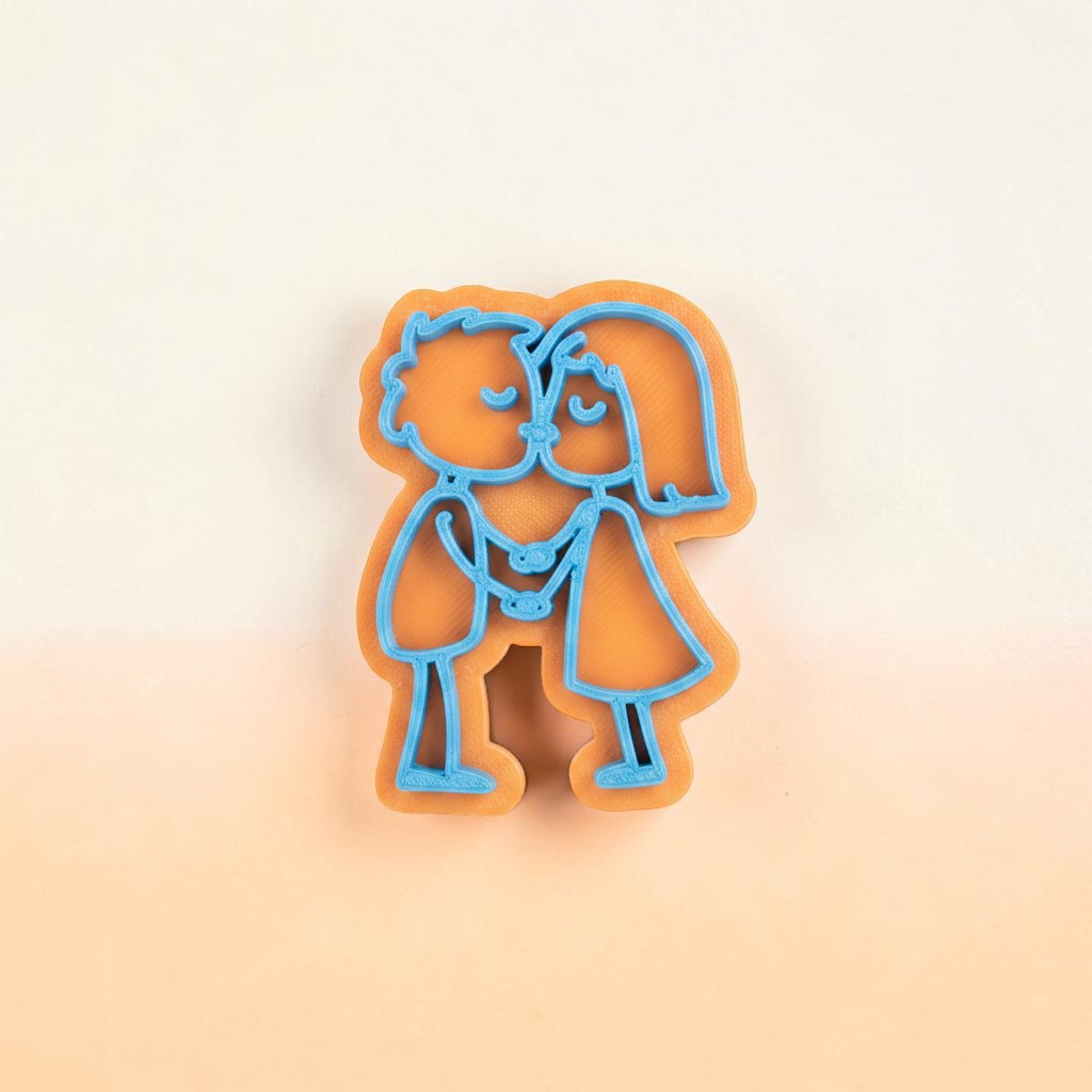 Sello texturizador Vallia Repostería de pareja de niños besándose estilo doodle en plástico PLA naranja y azul