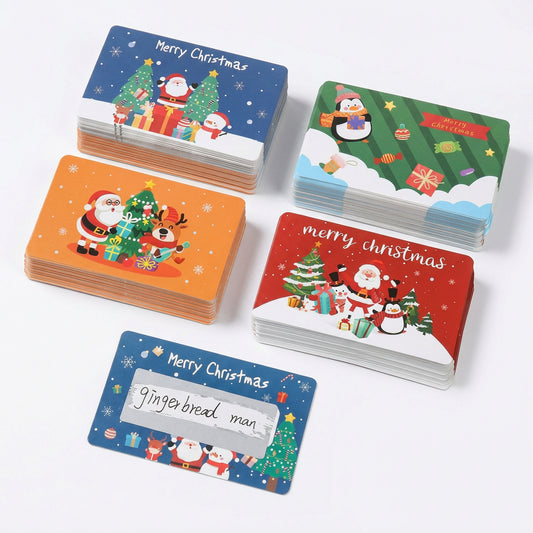 Set de tarjetas navideñas Vallia Repostería con diseños de Santa, pingüinos y renos para etiquetas de regalo.
