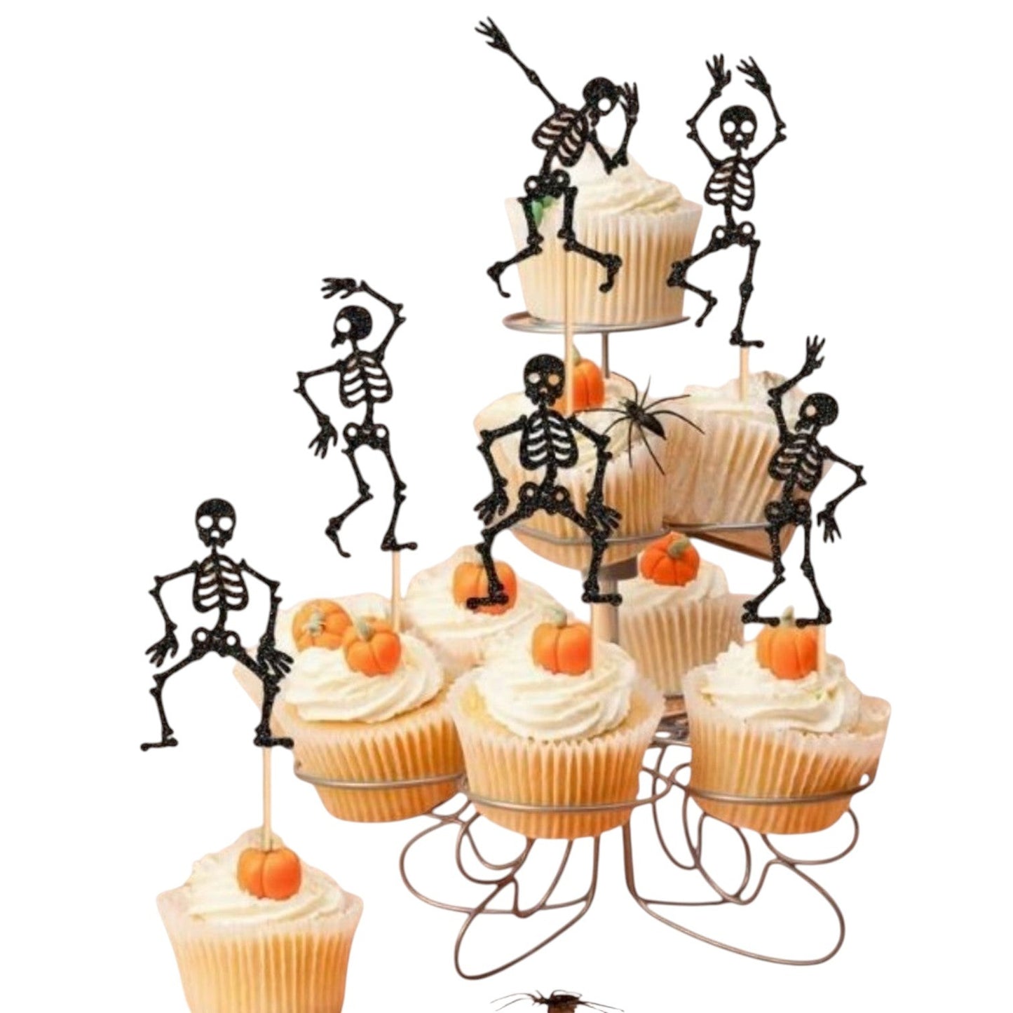 Toppers de esqueletos bailando con glitter negro de Vallia Repostería decorando cupcakes para Halloween