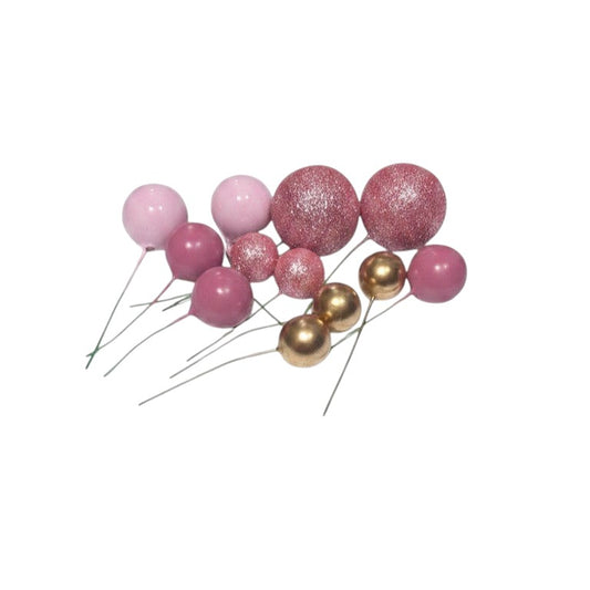 Toppers de globos en espuma Vallia Repostería, esferas decorativas rosadas y doradas con acabado brillante y mate.