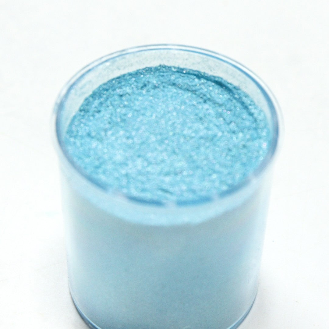 Vallia Repostería turquoise edible luster dust in a 10g jar with a fine shimmering metallic finish for cake decorating